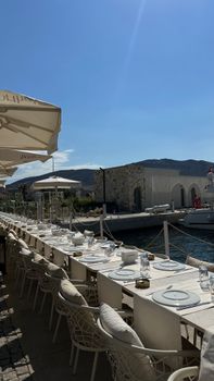 Long outdoor table setup by the sea in İzmir, perfect for a summer event.