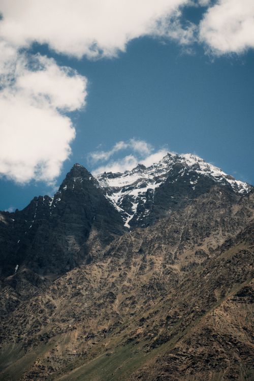 Free Breathtaking view of snow-capped Himalayan peaks in Lahul, Himachal Pradesh, India, under a clear blue sky. Stock Photo