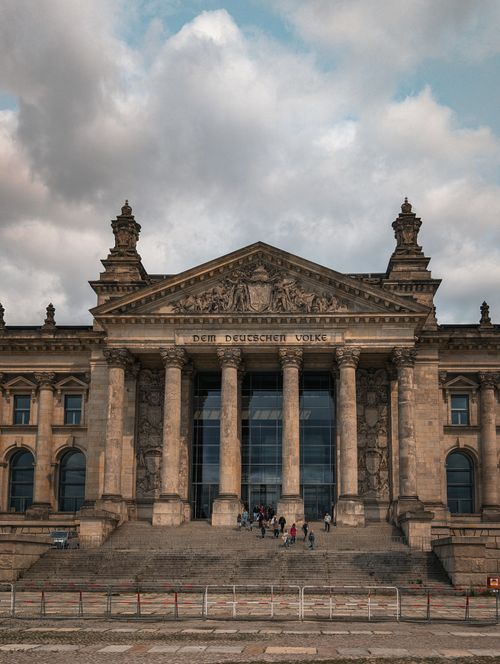Free Majestic view of the Reichstag Building in Berlin, a symbol of German history and governance. Stock Photo