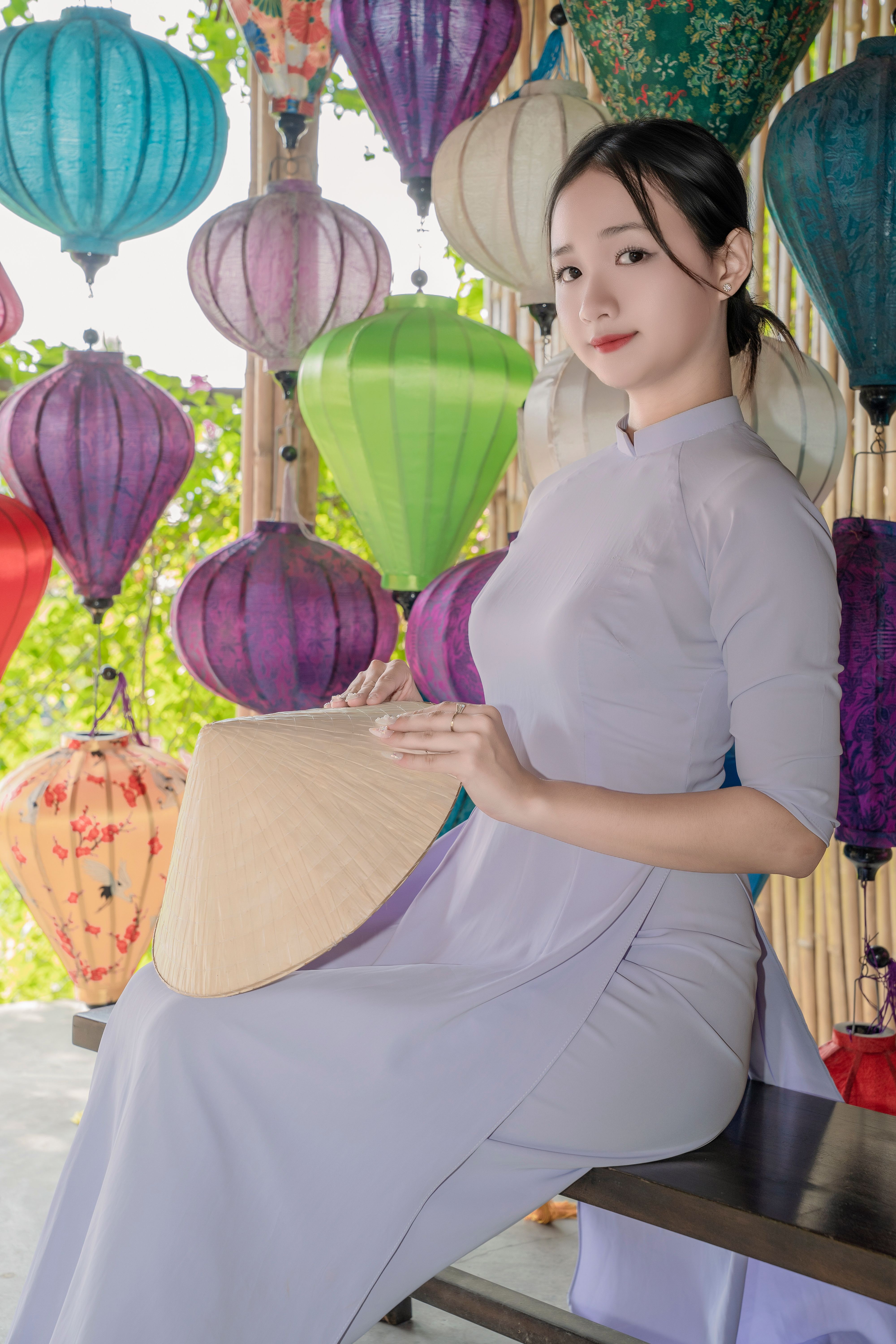 Elegant Woman in Traditional Dress with Lanterns · Free Stock Photo