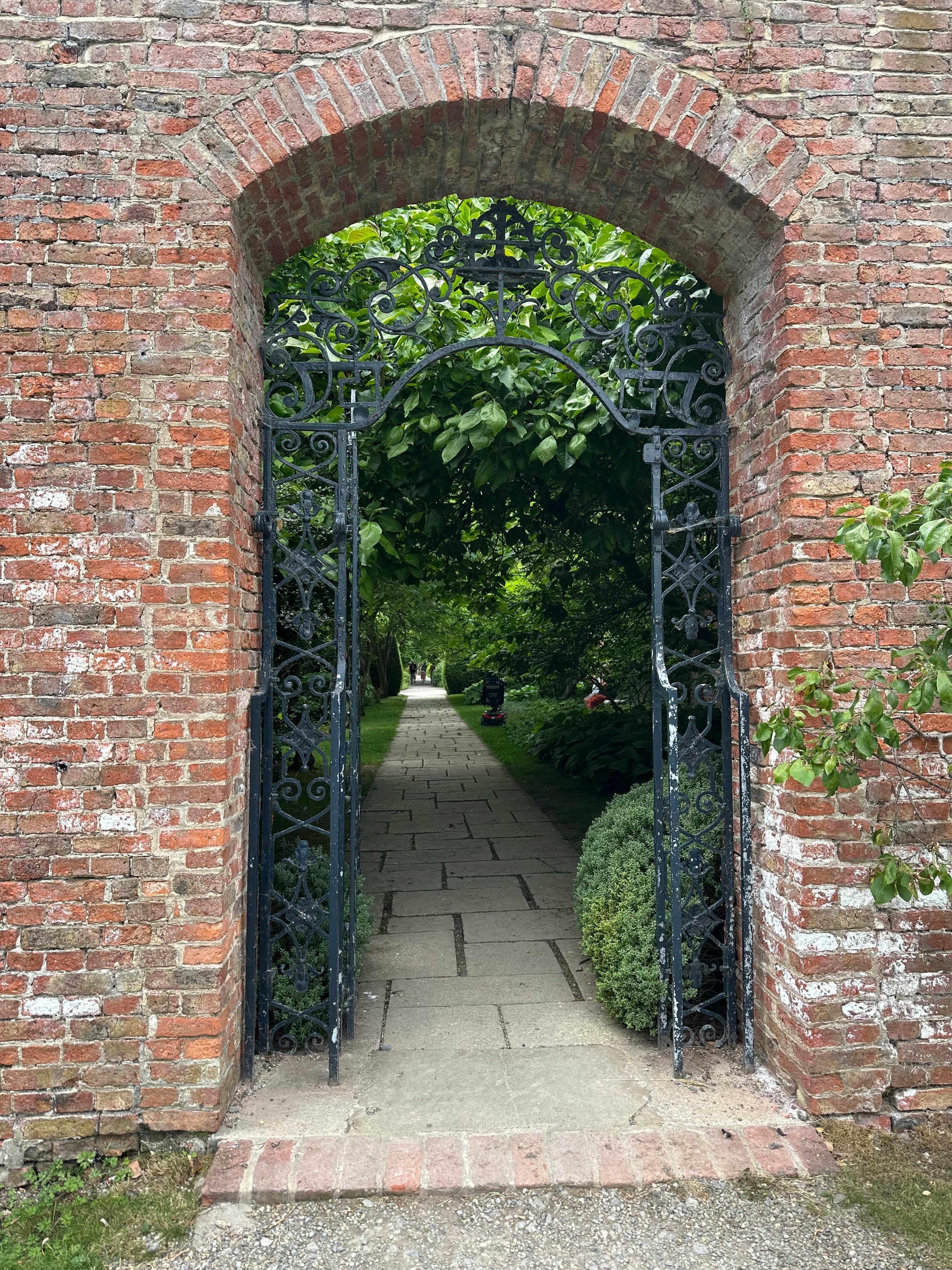inviting garden path raised beds UK