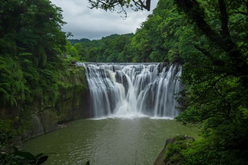 Free Breathtaking view of the iconic Shifen Waterfall surrounded by lush greenery. Stock Photo