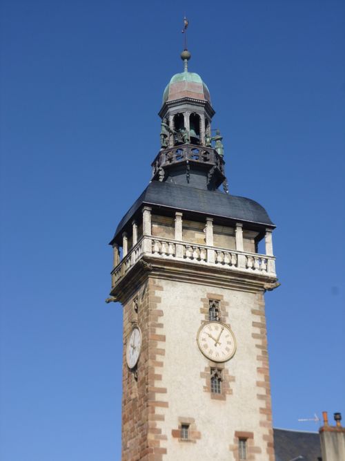 Free View of the historic Jacquemart Tower in Moulins, France under a clear blue sky. Stock Photo