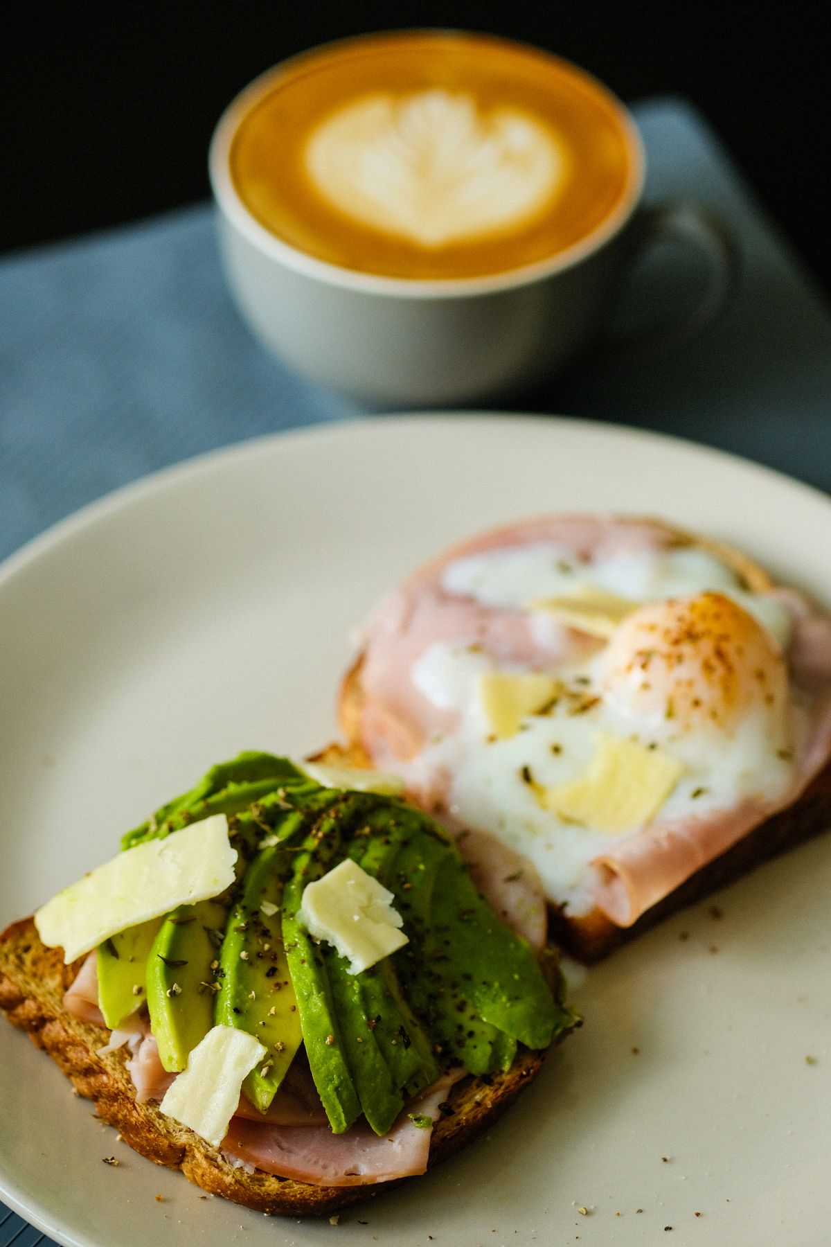 Avocado toast with poached egg served with coffee