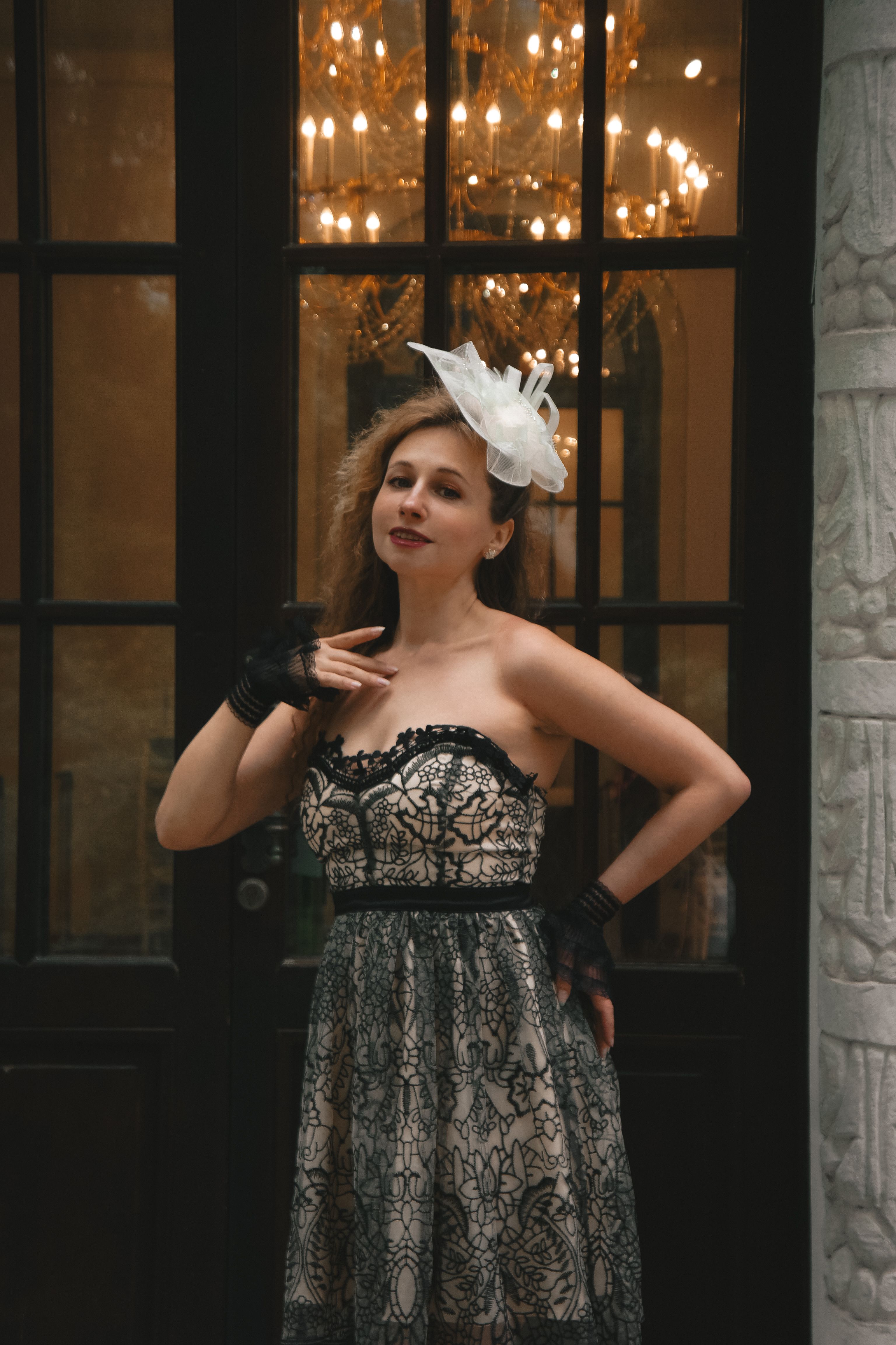 Elegant Woman in Black Dress with Fascinator  Free Stock Photo