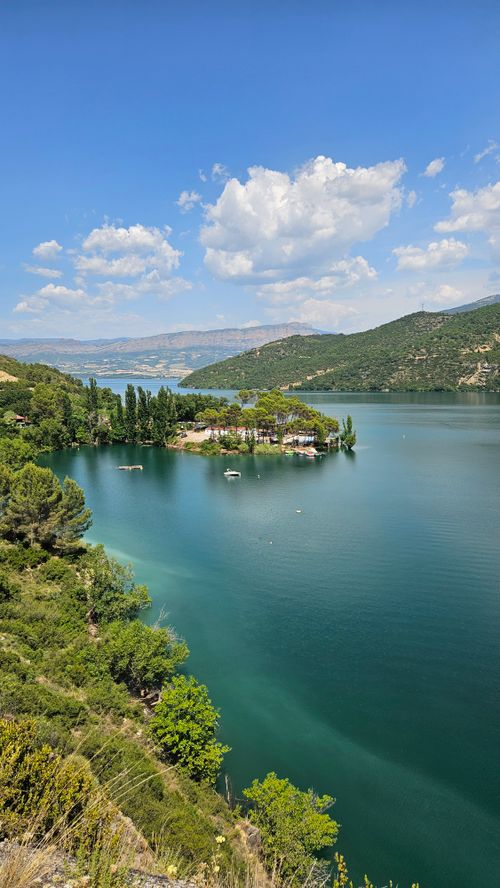 Free Explore the tranquil beauty of a lakeside landscape in Tremp, Catalunya, Spain. Stock Photo