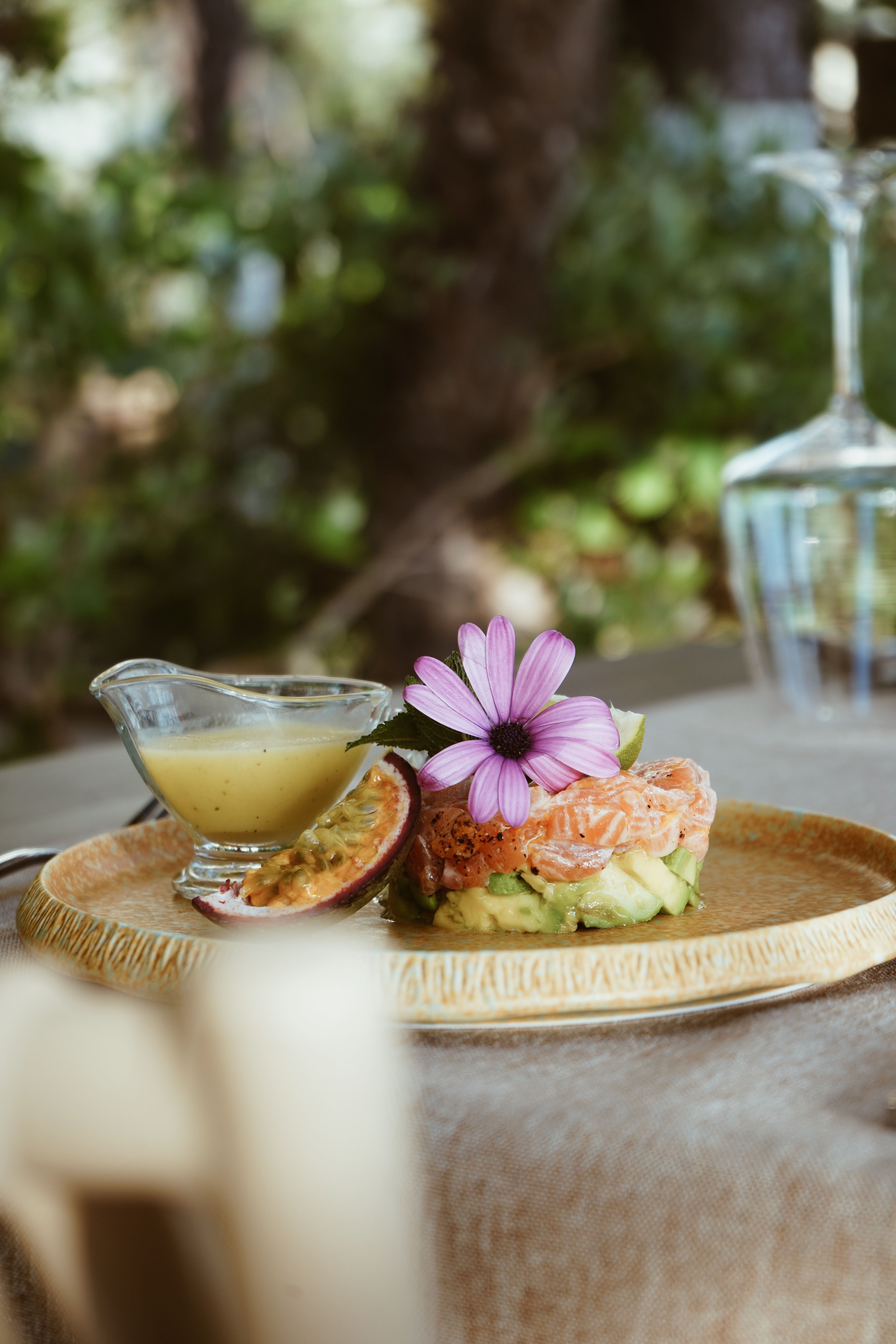 Plated first course with edible flowers