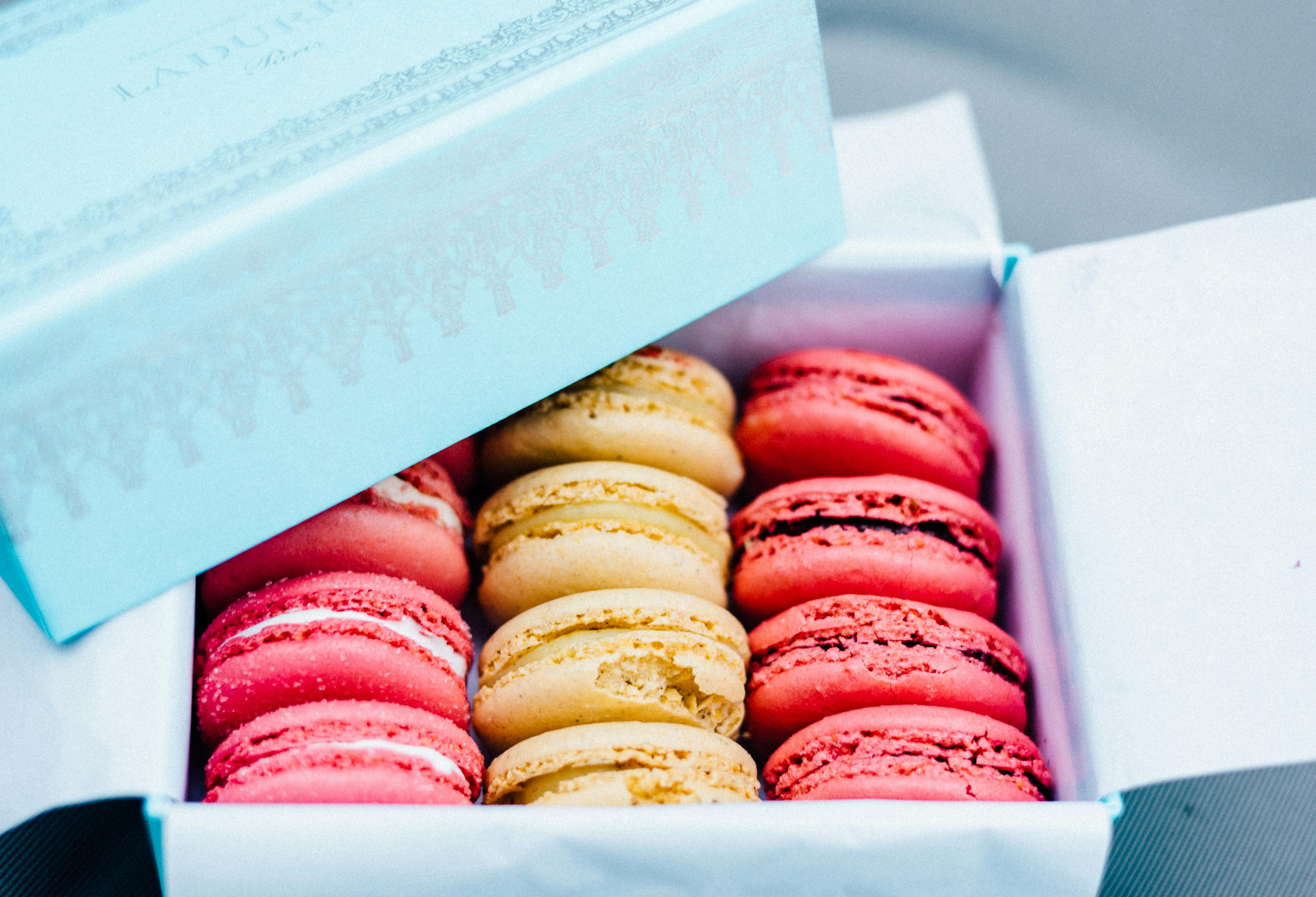 Assorted French pastries and macarons at a Parisian patisserie
