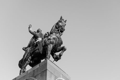 Free Black and white photo of a historic equestrian statue in Buenos Aires, Argentina. Stock Photo