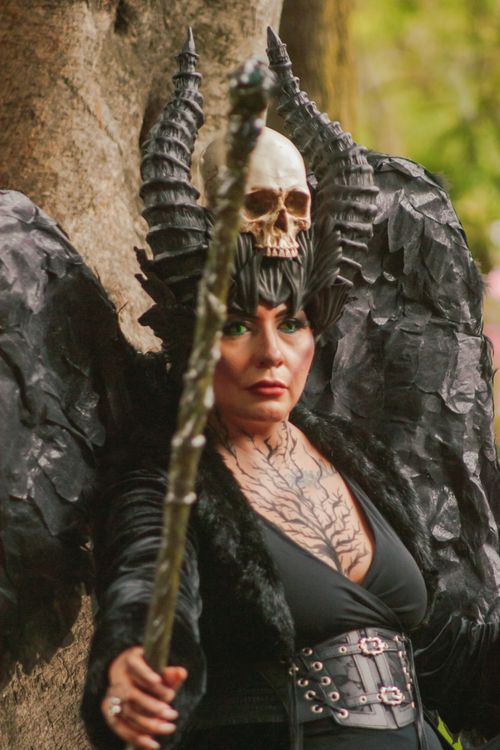 Free A fantasy-themed cosplay with skull and horns in an outdoor setting. Stock Photo
