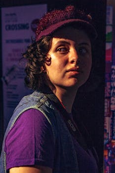 Artistic portrait of a woman in vintage style with retro vibe, captured in warm tones.
