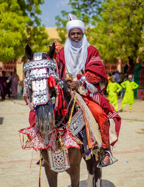 African Rider Colorful Traditional African Horse Rider Portrait · Free Stock Photo