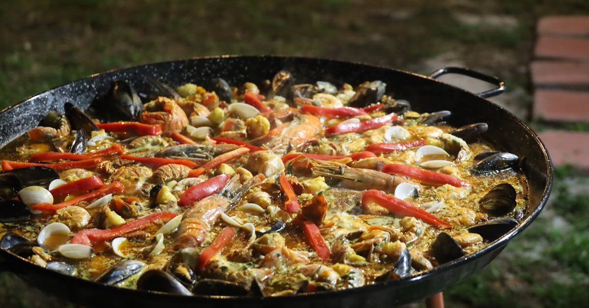 A farmer holding a basket of fresh vegetables.