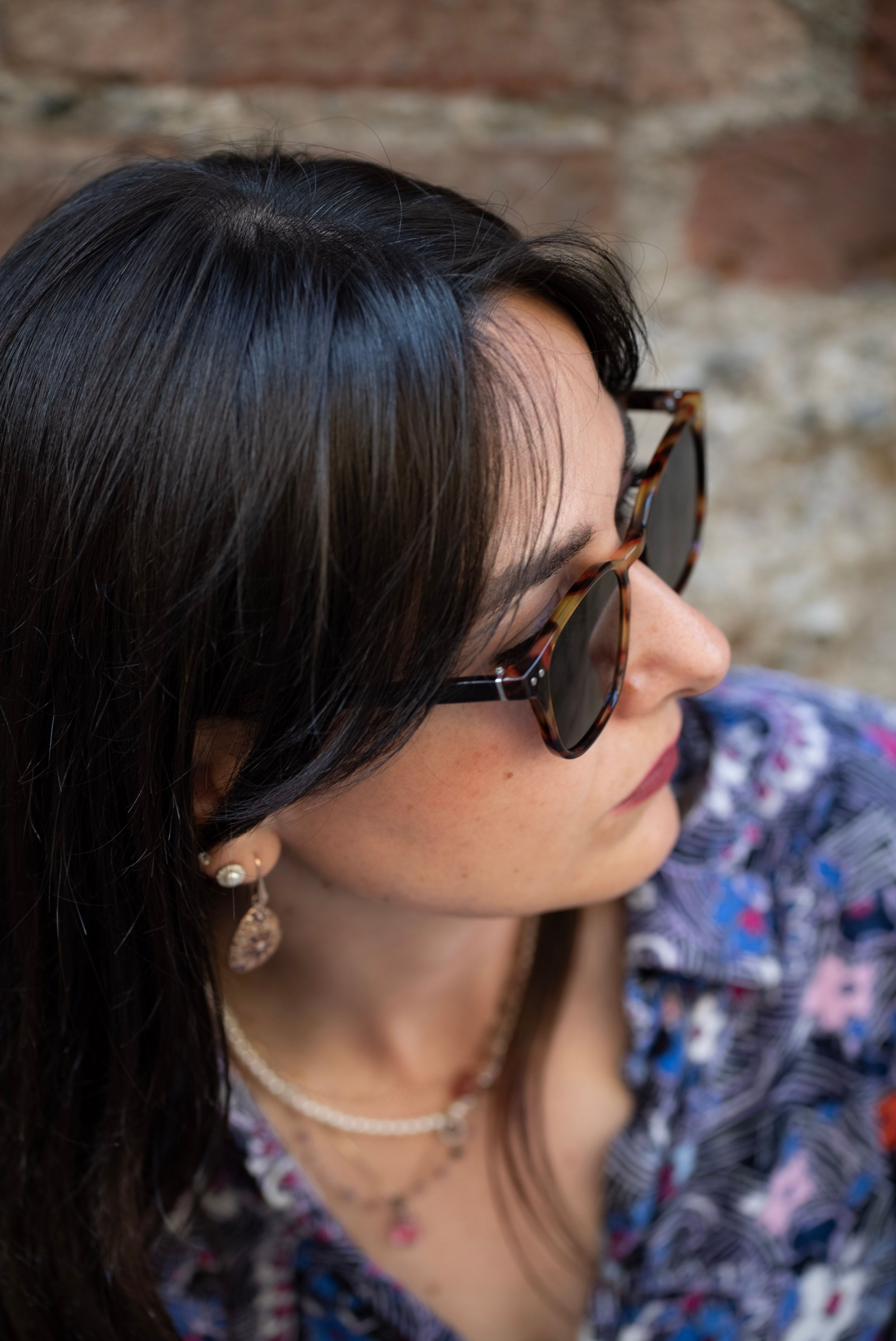 Stylish Woman in Sunglasses Posing Outdoors · Free Stock Photo