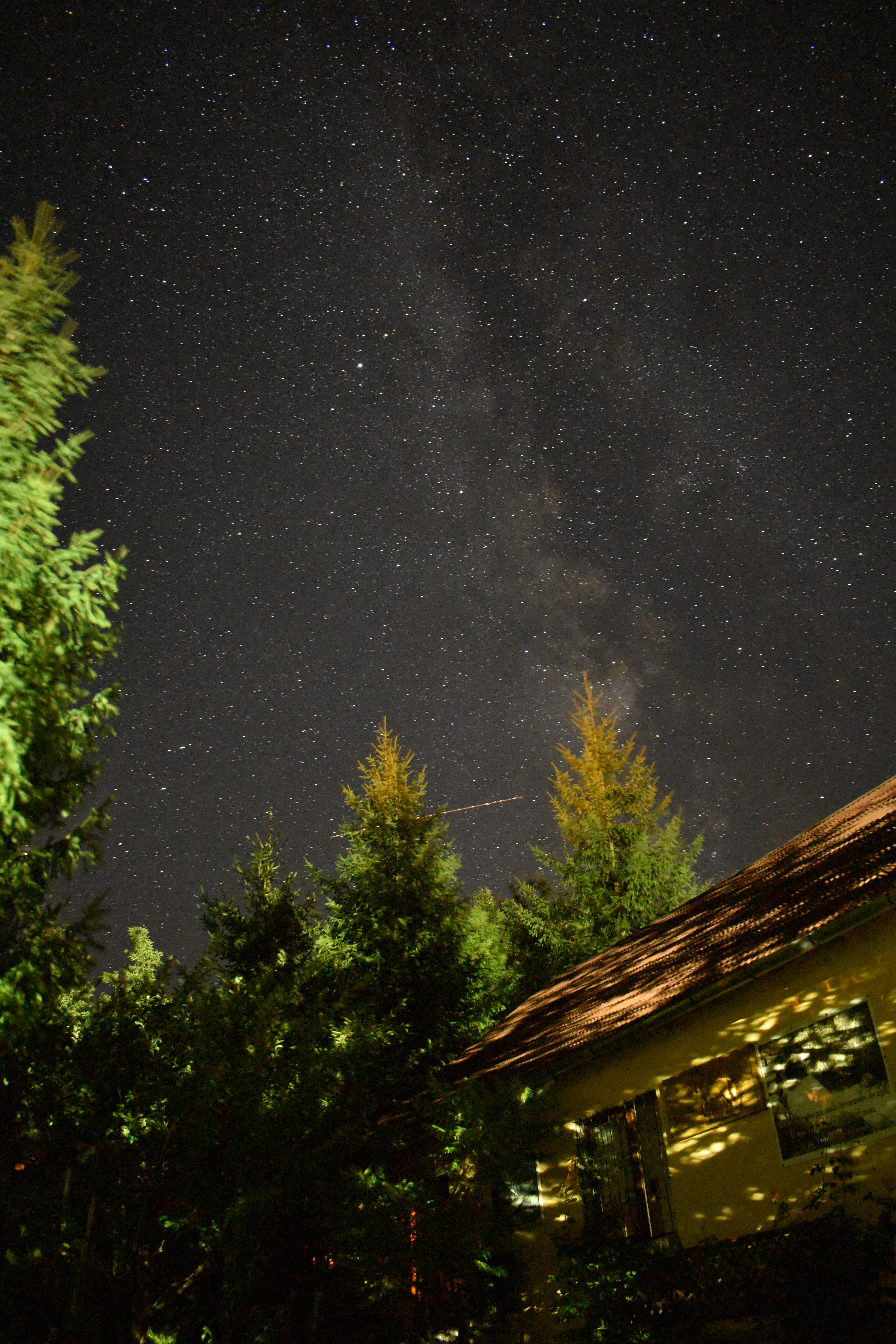 Photo of Lighted House Under Starry Night Sky · Free Stock Photo