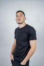 Casual Styled Portrait of Young Man in Black T-Shirt