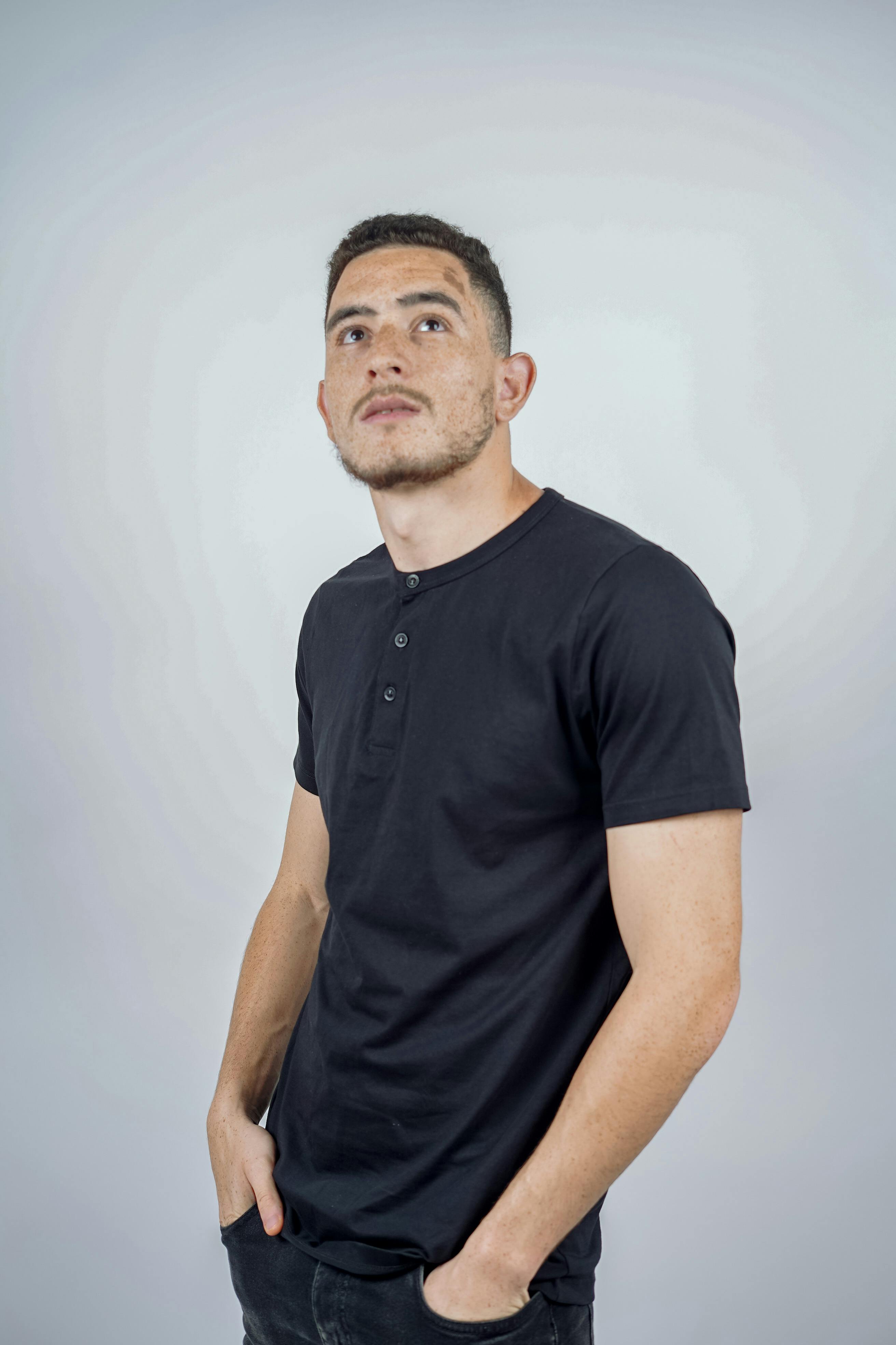 Casual Styled Portrait of Young Man in Black T-Shirt