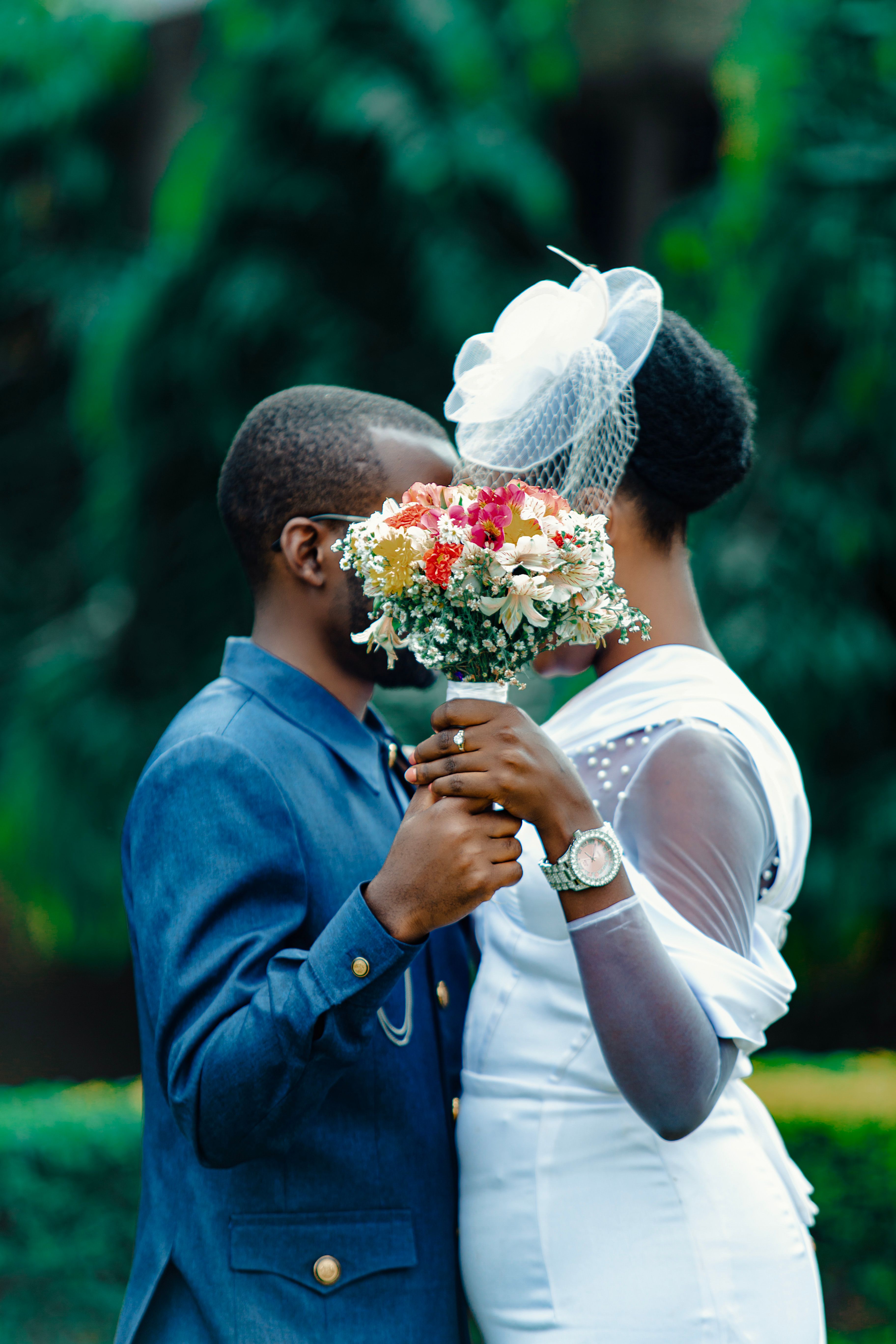 Romantic African Wedding Couple Embracing Outdoors · Free Stock Photo