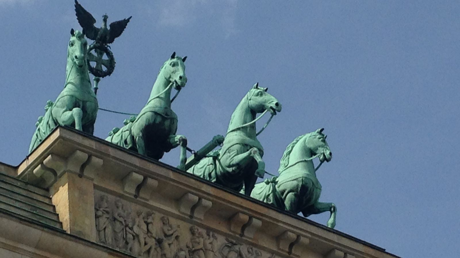 Close-up of the Quadriga sculpture on Berlin's Brandenburg Gate by day.