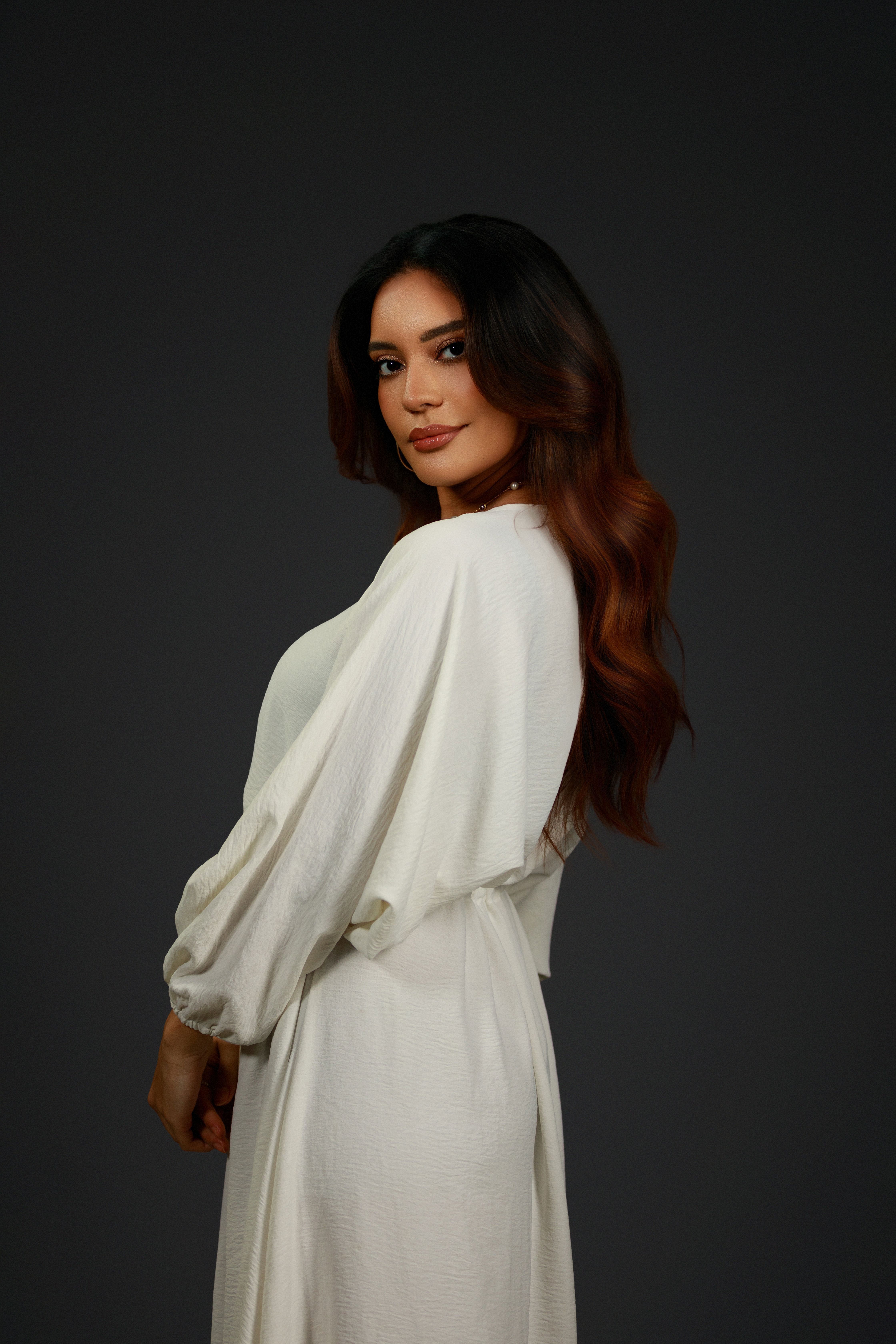 Elegant Portrait of a Woman in White Dress · Free Stock Photo