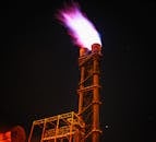 Low Angle View of Illuminated Tower Against Sky at Night