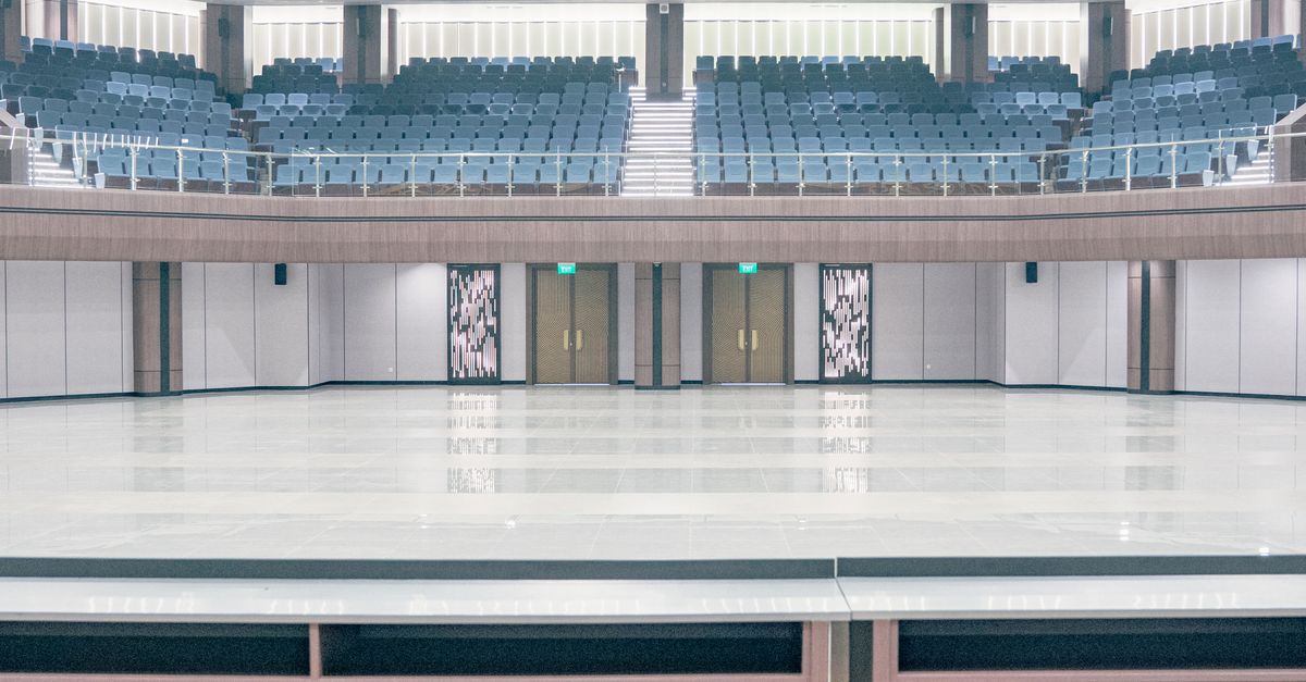 Modern Theater Interior with Seating and Stage · Free Stock Photo