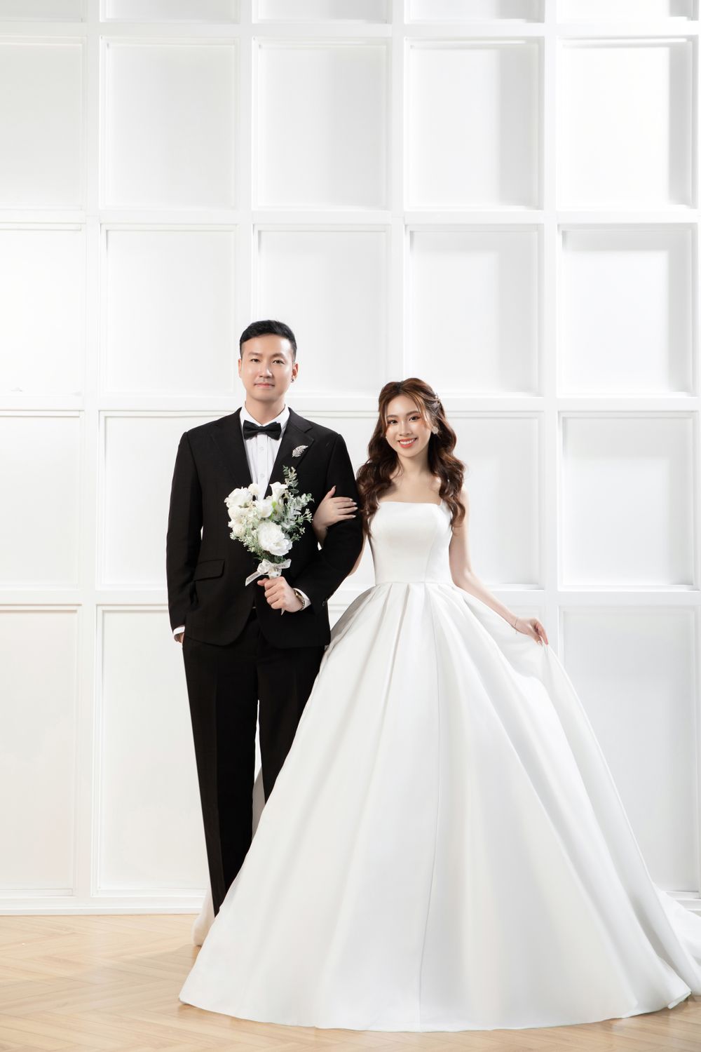A couple in classic wedding attire