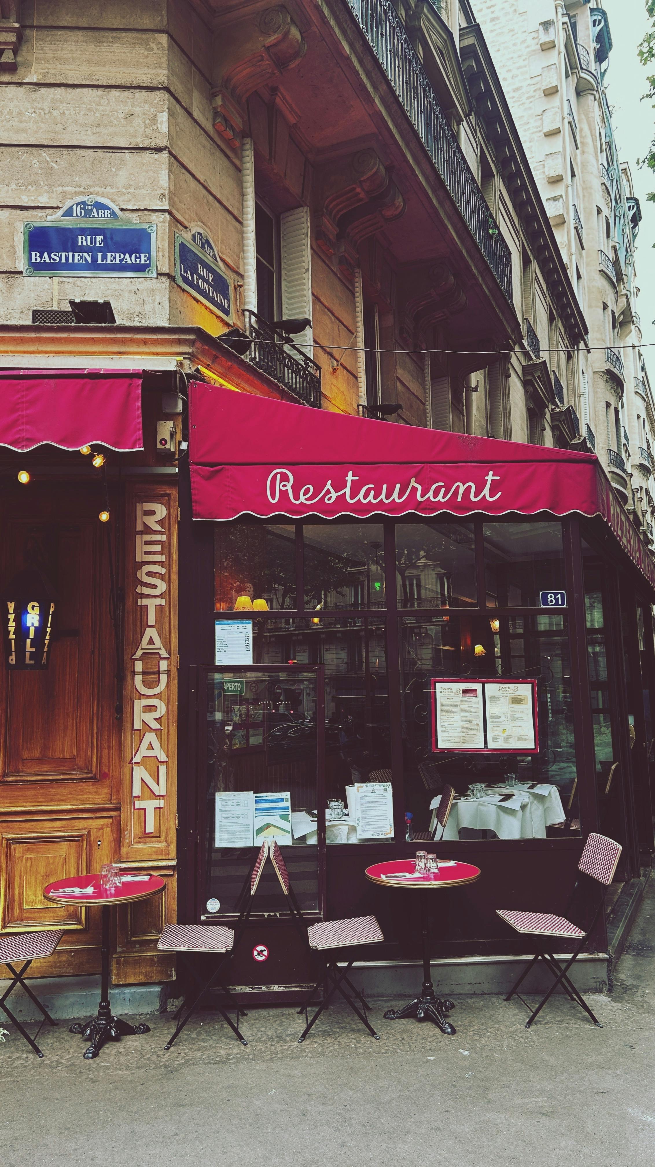 Explore a quaint Parisian cafe on Rue Bastien Lepage with classic outdoor seating and dining.