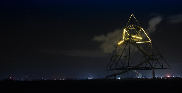 Light Trails In City Against Sky At Night