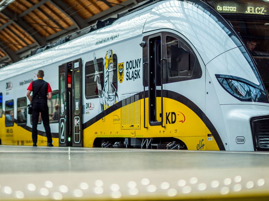 A modern passenger train at Wroclaw station featuring Dolny Śląsk branding.