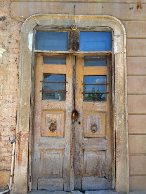 Free A vintage wooden door with a weathered texture in İstanbul, showcasing historical architecture. Stock Photo