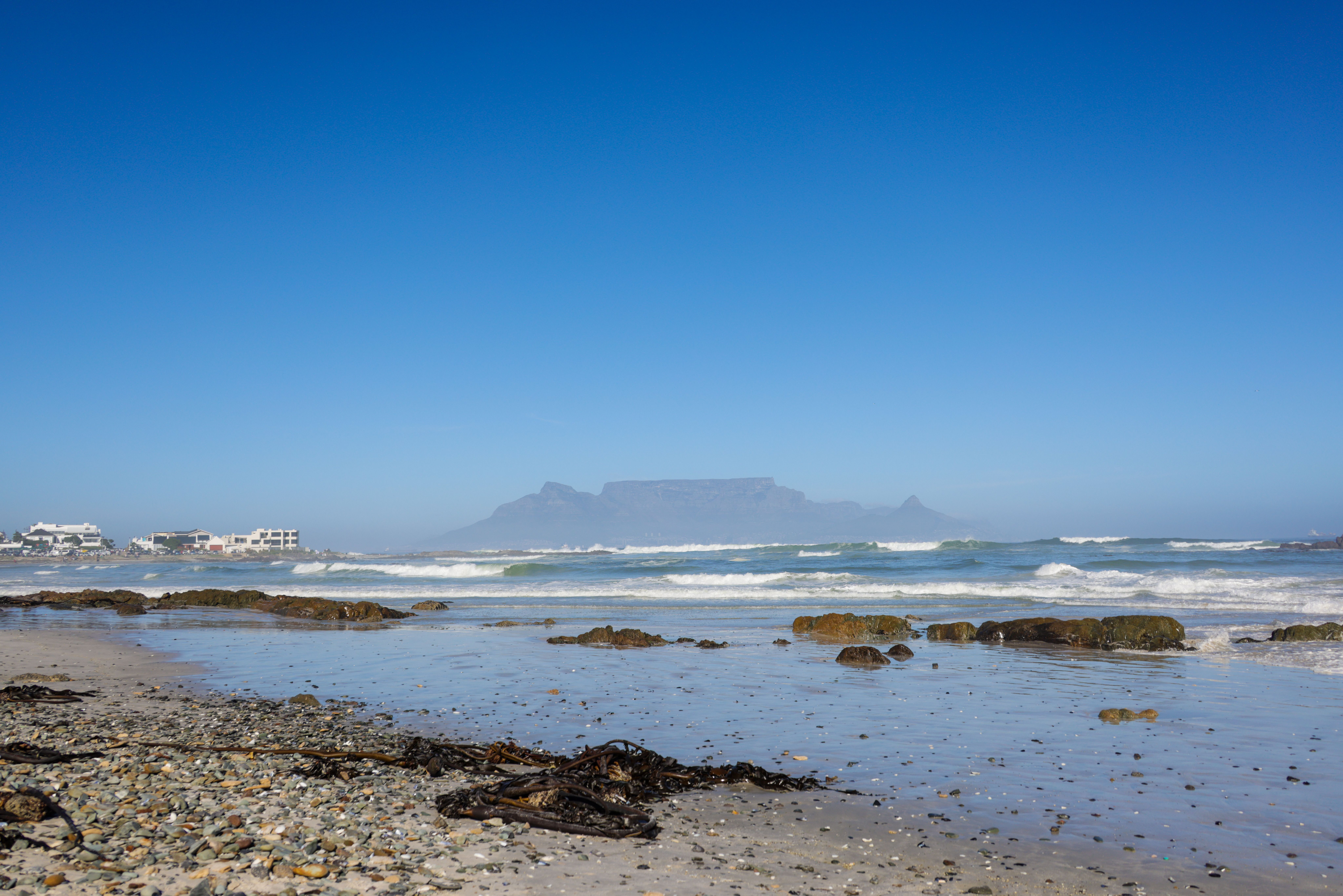 Scenic Beach View with Table Mountain in Distance · Free Stock Photo