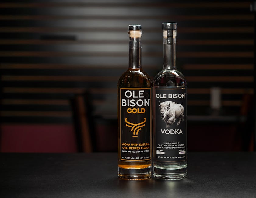 Showcasing Ole Bison Vodka bottles on a bar counter, New Orleans, with a moody ambiance.