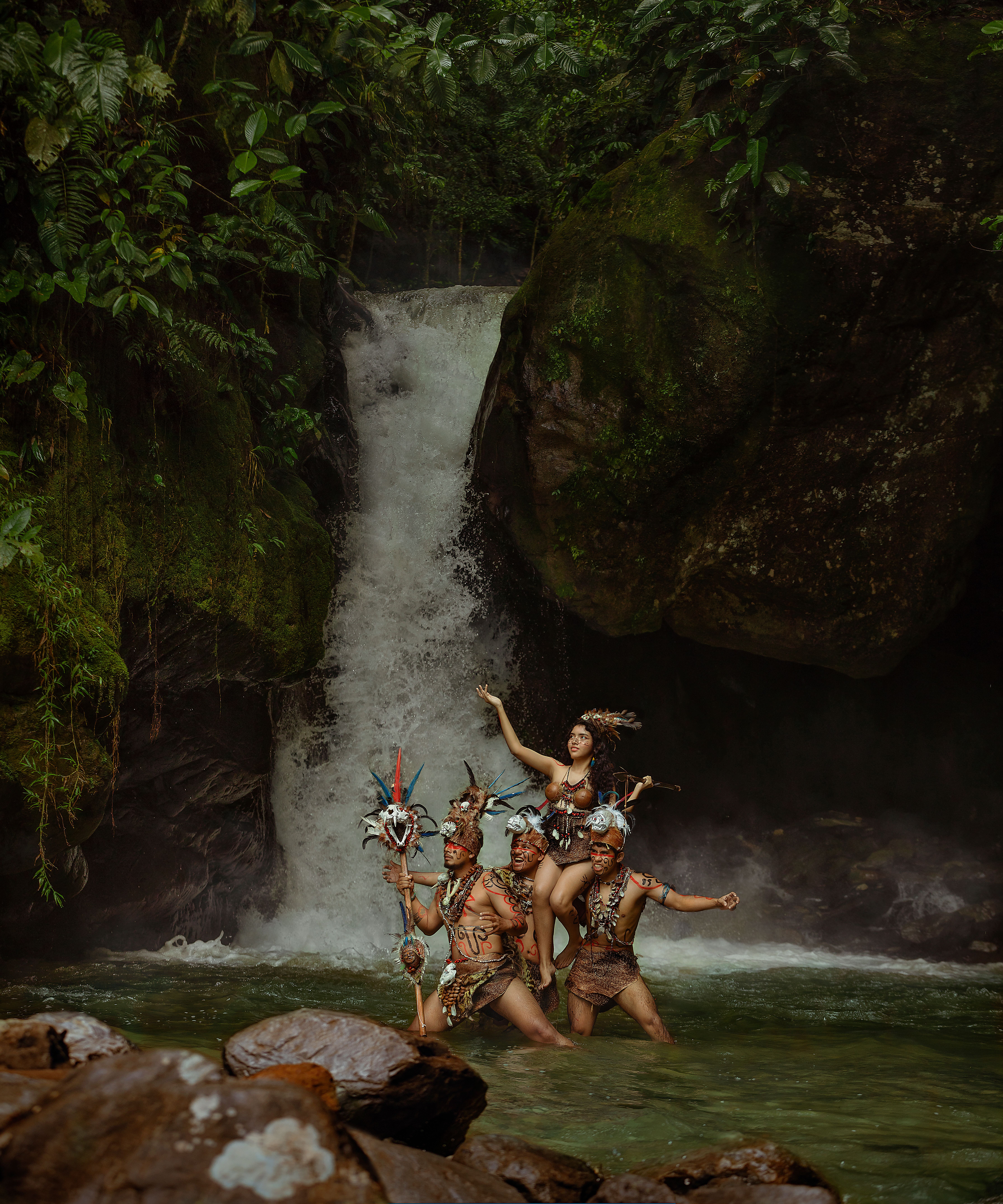 Traditional dancers performing by a waterfall in Tingo María, Peru. (Dancers in Tingo María — not San Roque.)