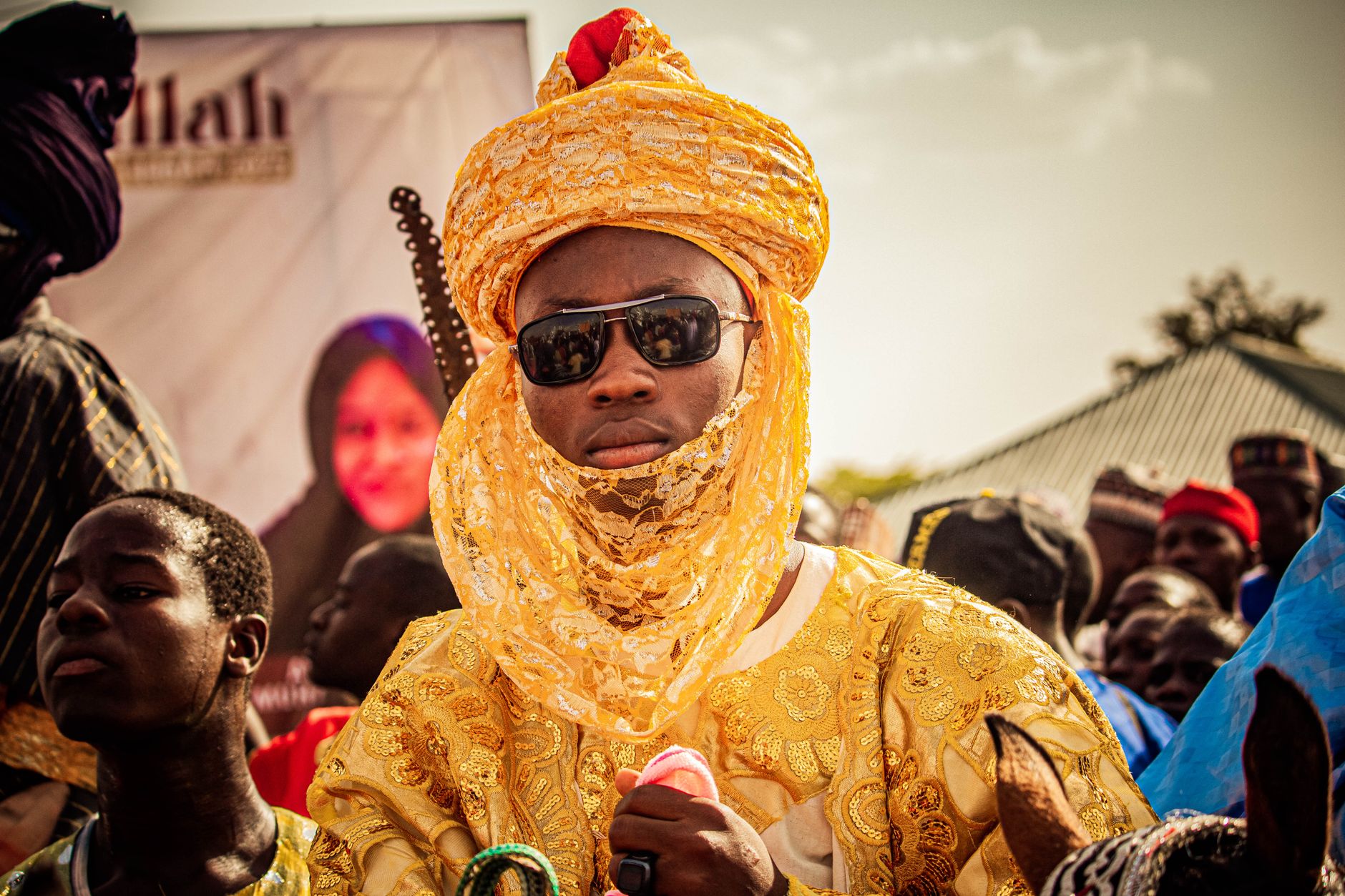 Colorful cultural celebration with people in traditional attire, highlighting heritage and festive spirit.