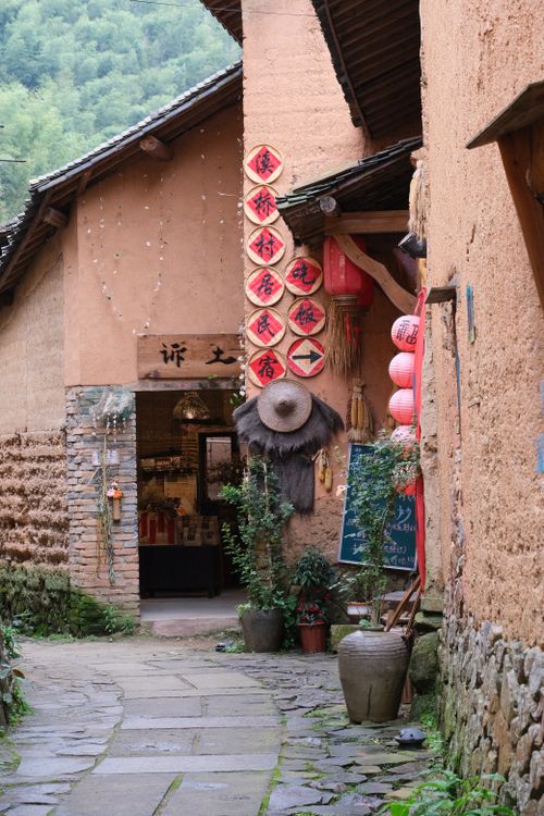 Free Explore a charming traditional village in Lishui, Zhejiang, featuring rustic architecture and cultural elements. Stock Photo