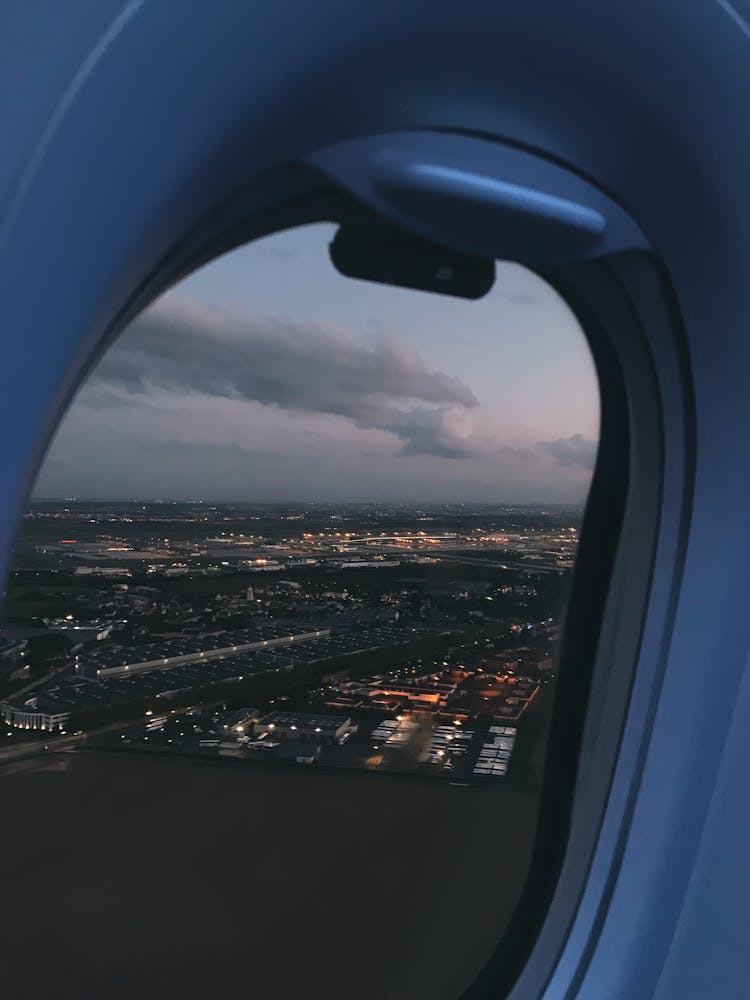 Night View Of City From Plane Window