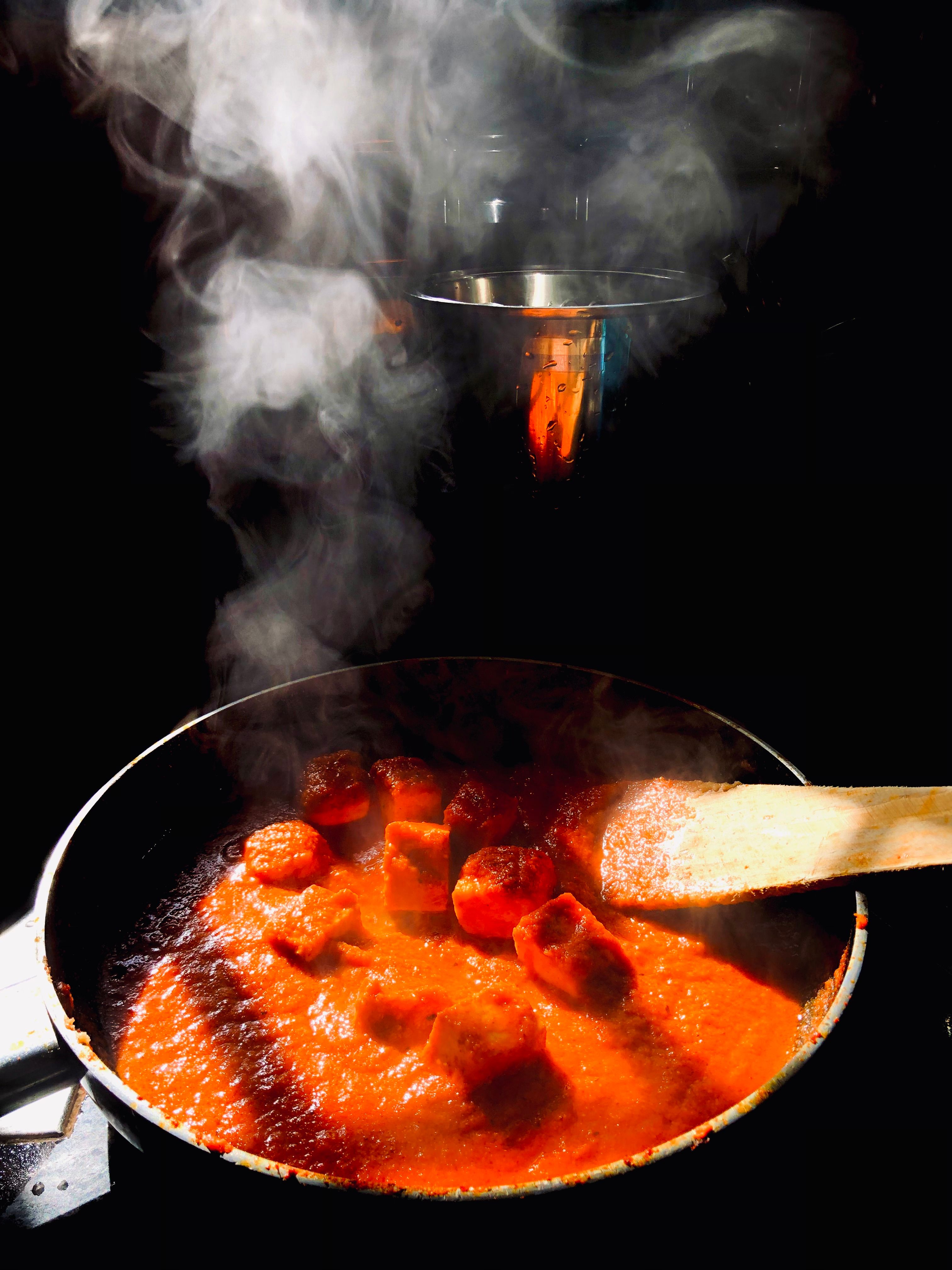 cooking sweet spicy sauce in pan