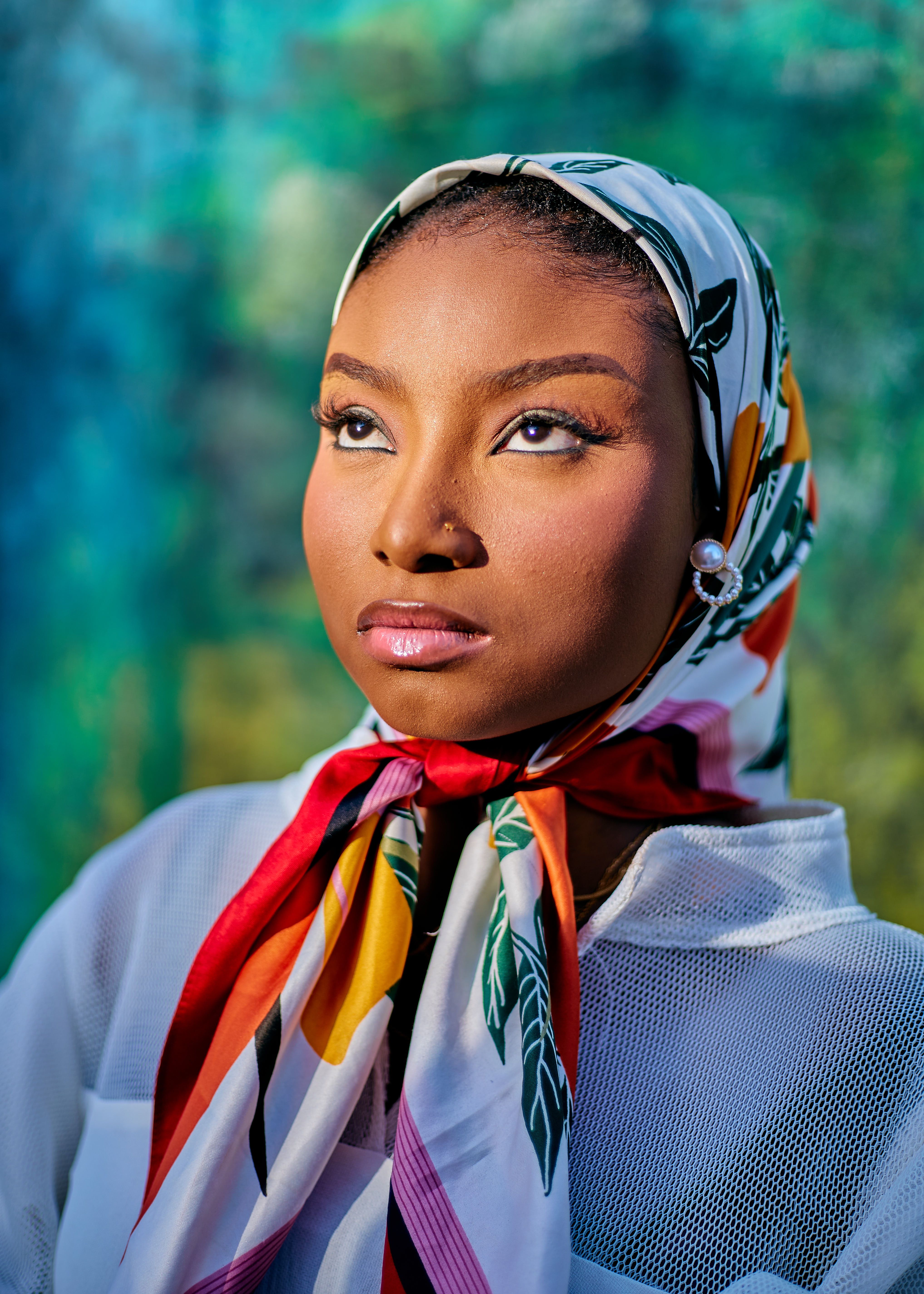 Vibrant Portrait of a Woman in Colorful Scarf · Free Stock Photo