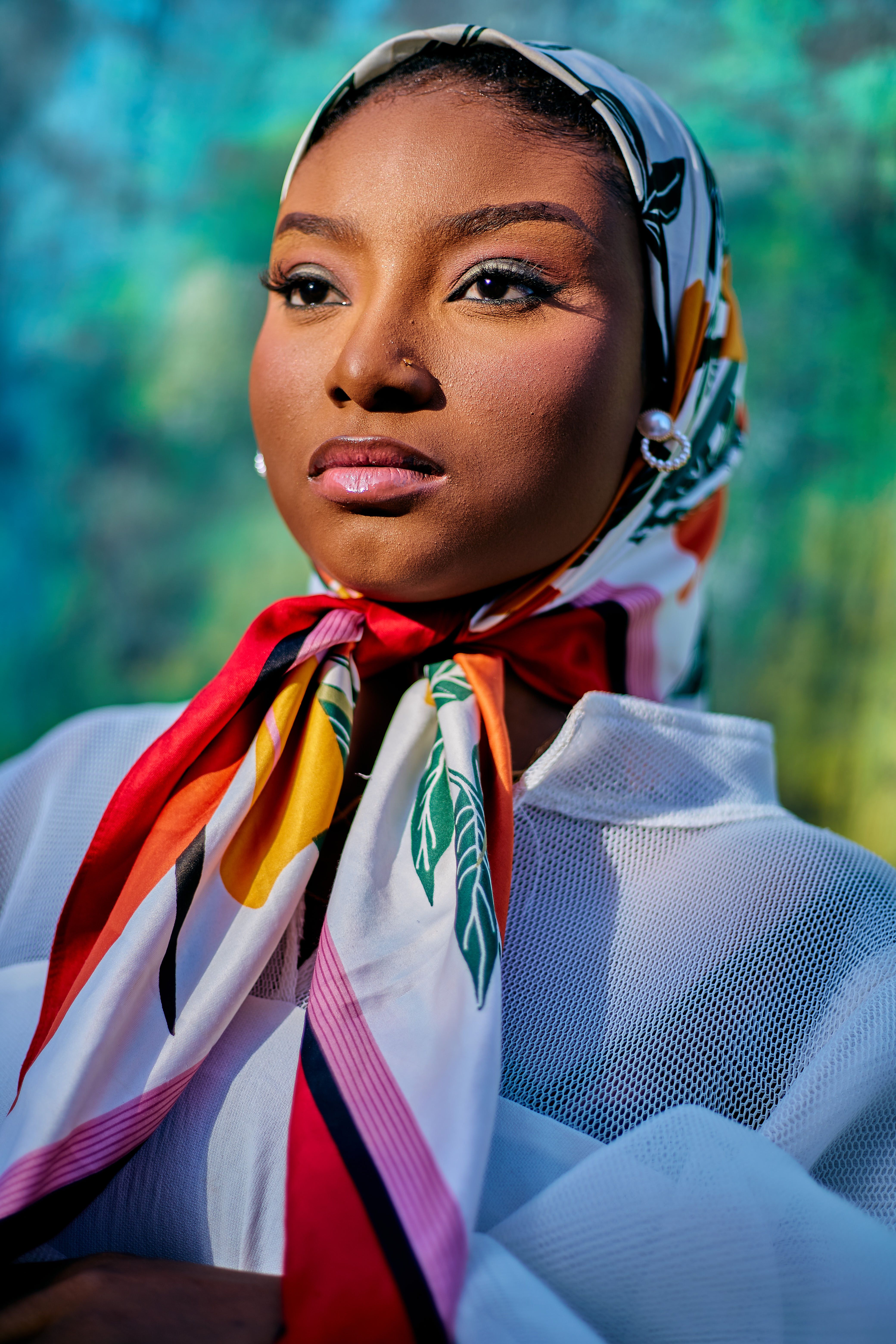 Portrait of Woman with Colorful Headscarf Outdoors · Free Stock Photo