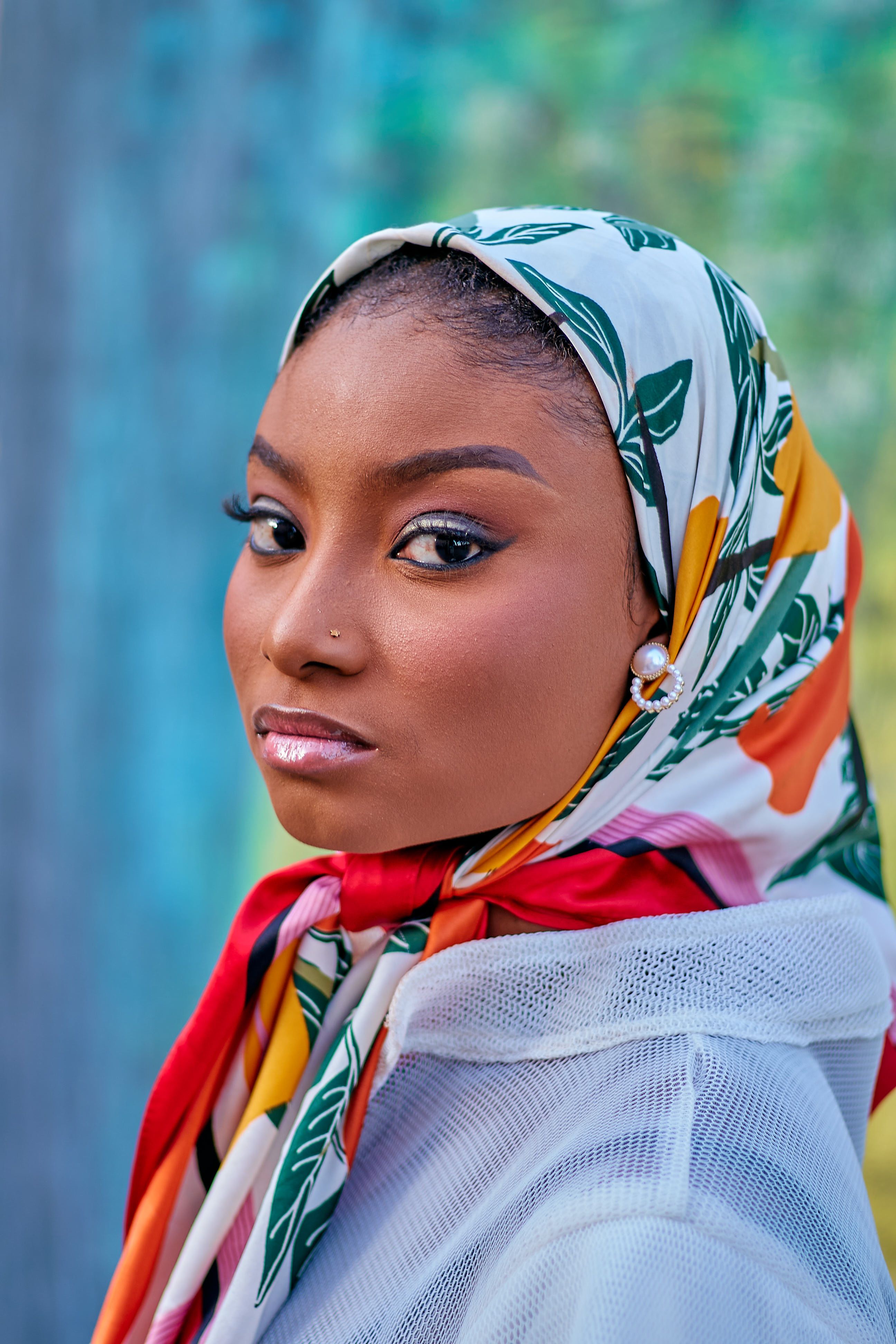 Elegant Portrait of Woman in Colorful Headscarf · Free Stock Photo