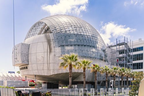Free Stunning view of the Academy Museum of Motion Pictures in Los Angeles under a blue sky. Stock Photo