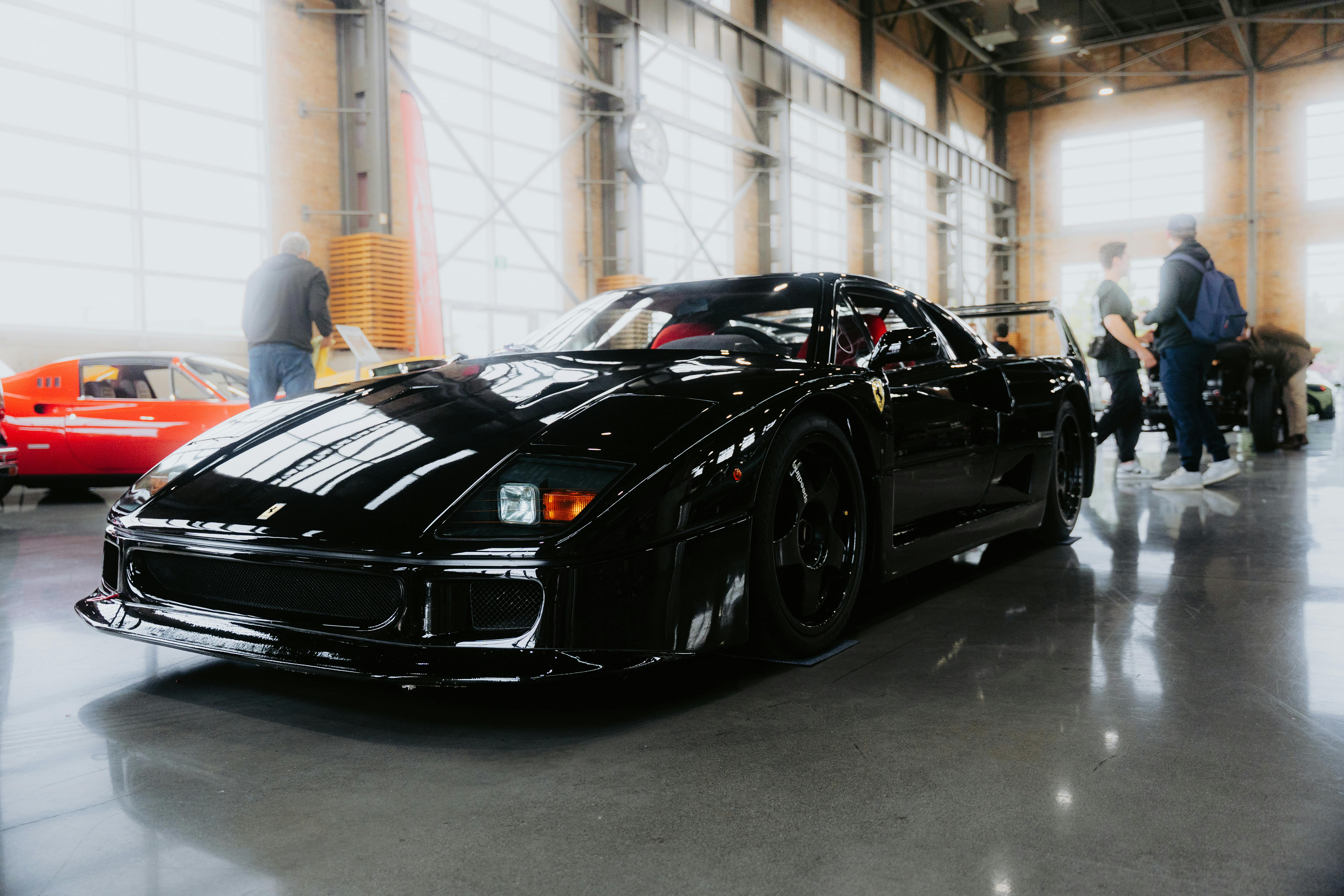 Automotive exhibition display wall setup with high-resolution graphics and sleek metal frame