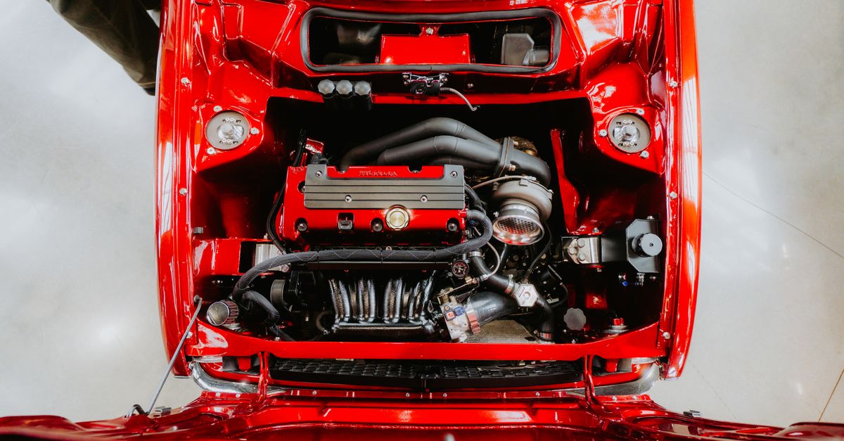 View Car Engine Close-up of Engine in Red Car from Above · Free Stock Photo