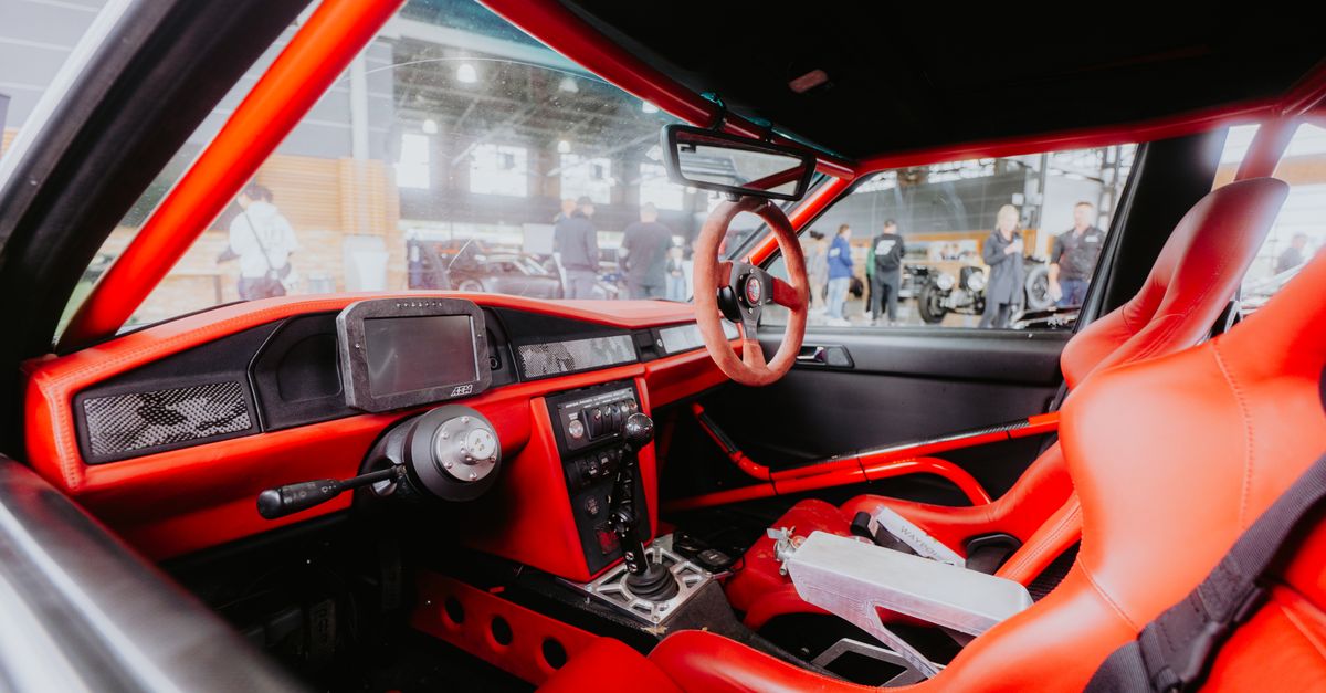 Red Sports Car Interior with Racing Seats · Free Stock Photo