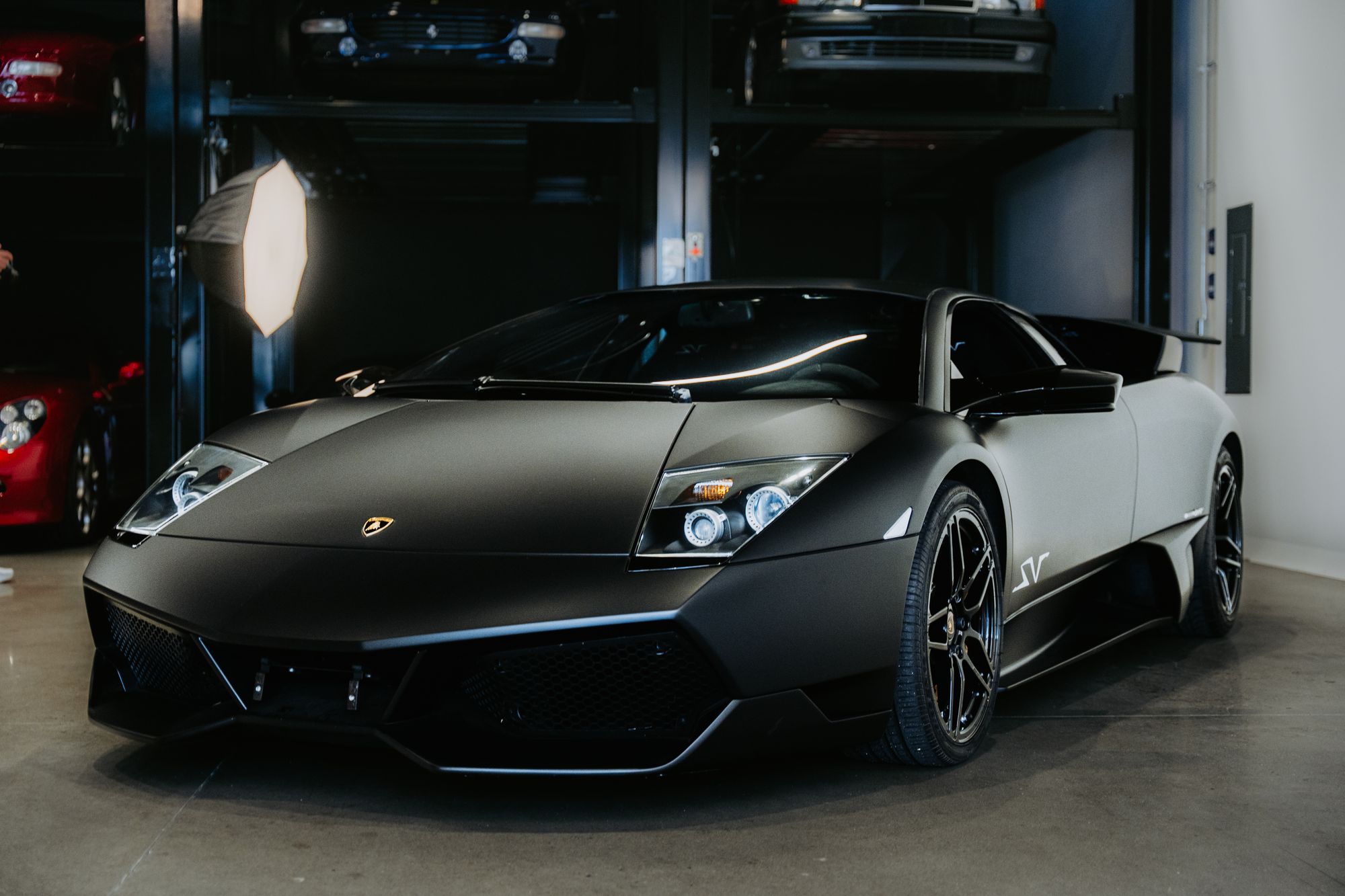 Lamborghini under studio lights ready for collection