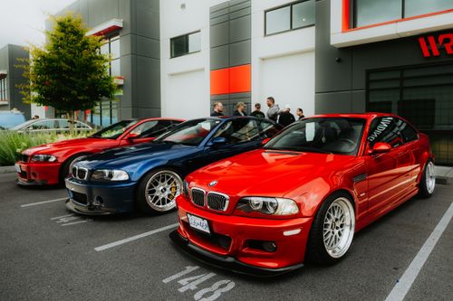 Free Colorful BMW cars displayed at an outdoor car show event, ideal for automotive enthusiasts. Stock Photo