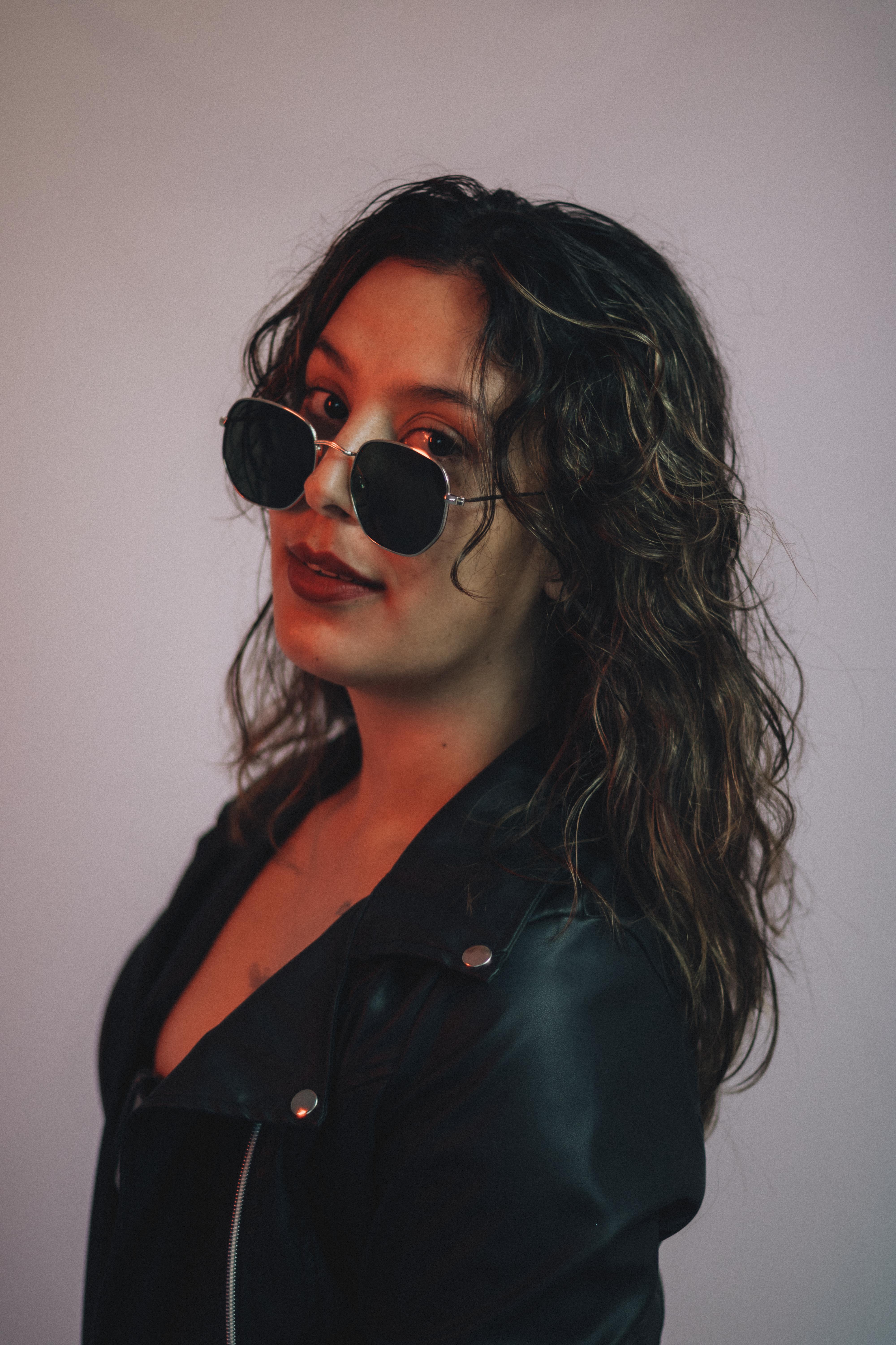 Woman In Black Leather Jacket Wearing Black Sunglasses · Free Stock Photo