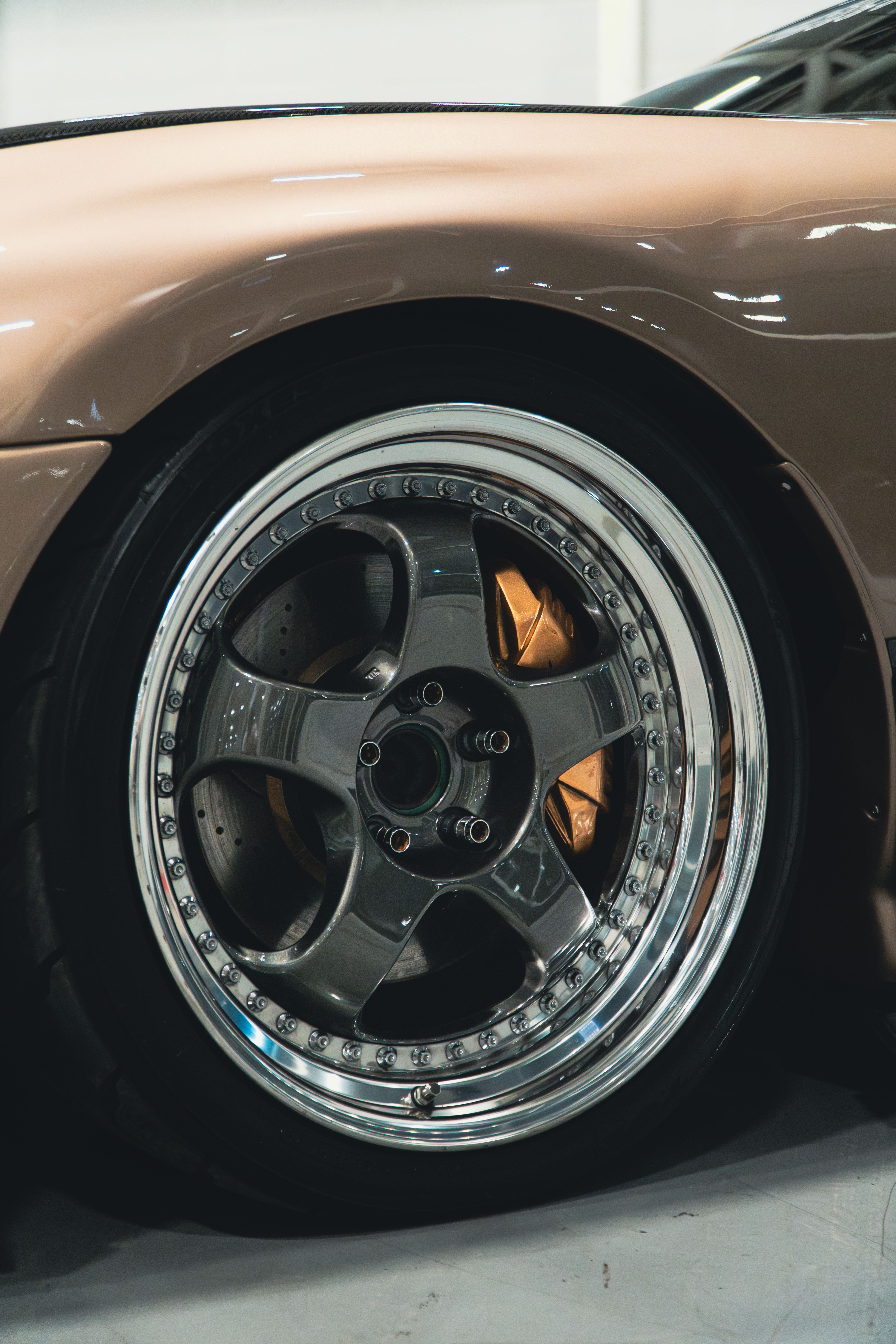 Close-up of a Shiny Silver Car Wheel Rim · Free Stock Photo