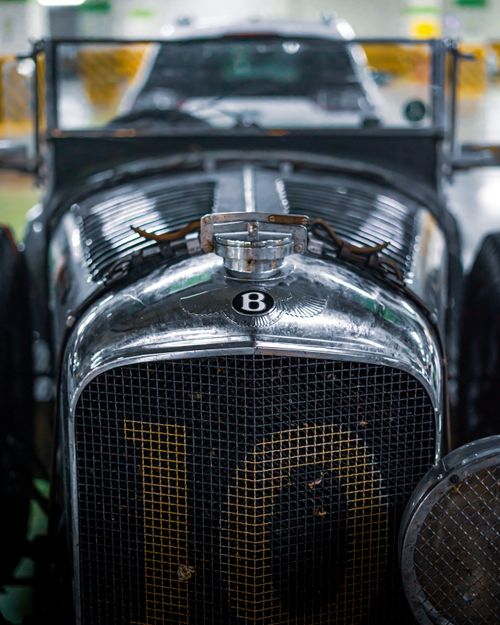 Free Detailed view of a vintage Bentley car grille, highlighting classic automotive design. Stock Photo
